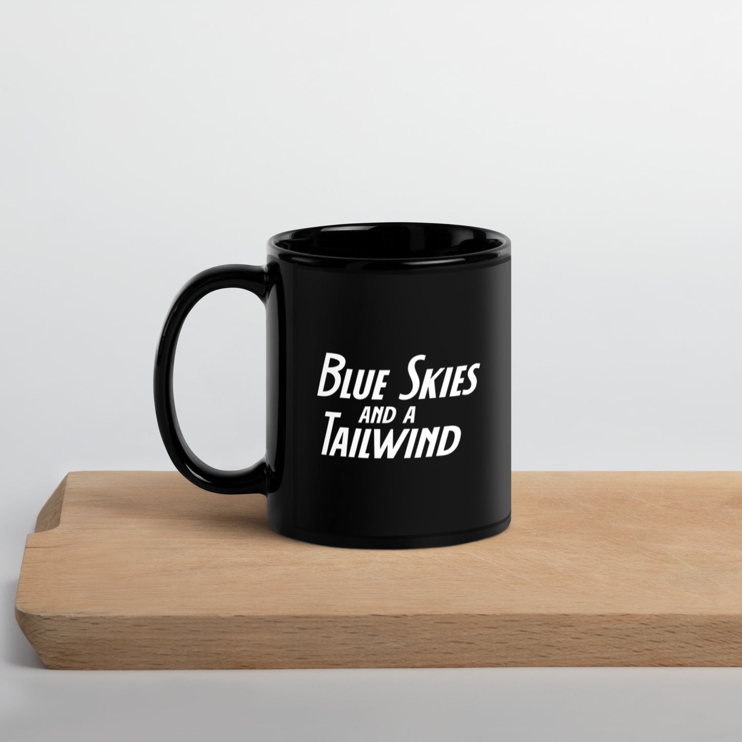 Blue Skies and a Tailwind Black Glossy Mug